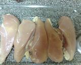 A picture of step 3 of Cheese And Tomato Pesto Chicken.
