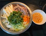 Hình bước làm 3 của món Nộm tai heo cổ hũ dừa