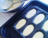 A picture of step 4 of Moist Honey Madelines.
