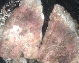 A picture of step 2 of Rib tips in a cast iron skillet.