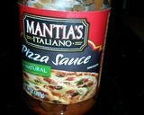 A picture of step 3 of Jens famous Lil pizzas.