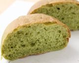 A picture of step 14 of Matcha and White Chocolate Buns Bread Machine Version.