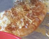 A picture of step 12 of Chicken enchiladas.
