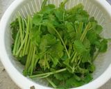 A picture of step 1 of Simple Parboiled Japanese Parsley and Maitake Mushrooms.