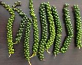 A picture of step 1 of Green peppercorn pickle.
