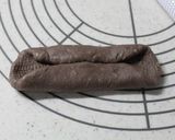 A picture of step 5 of Chocolate Filled Black Cocoa Cornets and Rolls.