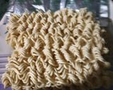 A picture of step 1 of Maggi pizza.
