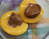 Foto del paso 3 de la receta: Duraznos en almíbar con dulce de leche