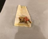 A picture of step 7 of Cheese Steak Egg Rolls.