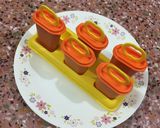 A picture of step 9 of Mango Popsicles.