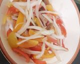 A picture of step 2 of Easy Nachos with Vegetables and Beans.