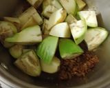 A picture of step 2 of Jowar Bhakri with brinjal potato vegetable curry.