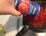 Foto del paso 4 de la receta: Calamares enlatados en su tinta con arroz negro