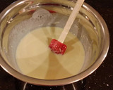A picture of step 4 of Whipped White Chocolate Raspberry Ganache Frosting and Filling.