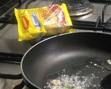 A picture of step 2 of Burnt chilli garlic Maggi.
