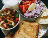 A picture of step 4 of Pavbhaji with buttermilk papad and salad.