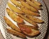 Foto del paso 12 de la receta: Pollo al ajillo y romero al horno con patatas asadas