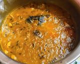 A picture of step 5 of Red lentil with rohu fish head.