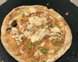 A picture of step 4 of Paratha Omelet Pizza.