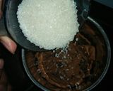 A picture of step 3 of Biscuit cake in a pan.