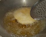 A picture of step 5 of Aloo puri.