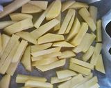 Foto del paso 1 de la receta Patatas fritas en el horno con jamón y huevos