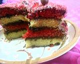 A picture of step 8 of 4 layer vanilla red cake.