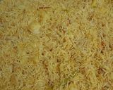 A picture of step 12 of Aloo Pulao.
