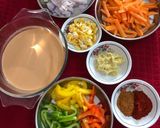 A picture of step 5 of Authentic Thai Red Chicken Curry.