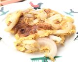 A picture of step 6 of Onion Omelette.