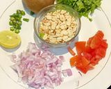 A picture of step 1 of Kiwi And Peanut Salsa.