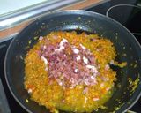 Foto del paso 2 de la receta: Pimientos rellenos de calamares, arroz y jamón serrano