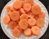 A picture of step 1 of Tri colour chutney (Carrot,Coconut,Green leaves).
