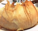A picture of step 5 of Brie cheese wrapped in phyllo pastry.