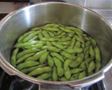 A picture of step 4 of Garlic Edamame - Great When Drinking.