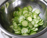 A picture of step 2 of Marinated Tomato and Cucumber.