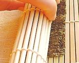 A picture of step 11 of Kimbap (Korean-style Sushi Rolls).