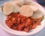 A picture of step 4 of Boiled yam and palm oil stew.