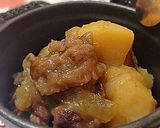 A picture of step 11 of Waterless Nikujaga (Simmered Meat and Potatoes) in a Staub Cocotte.