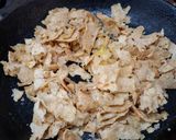 A picture of step 2 of Meethi choori(roti flakes cooked in ghee and jaggery).