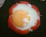 A picture of step 3 of Egg sunny side up with Red Pepper, Quinoa and Bacon.