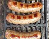 A picture of step 4 of Tailgater Beer Brats with Zippy Cheese Sauce.