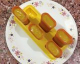 A picture of step 8 of Mango Popsicles.