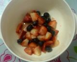 A picture of step 2 of Strawberry and Blueberry No-Bake Cheesecake Mousse.