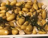 Une image de l'étape 8 de Pommes grenailles au thym, ail et romarin.