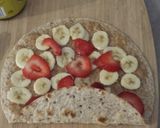 A picture of step 5 of Fruits & Almond Butter Wrap.