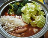 A picture of step 4 of Easy Tomato Hot Pot with Lots of Melting Cheese.