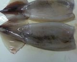 A picture of step 3 of Self-braising Scrumptious Rice Stuffed Squid.