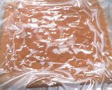 A picture of step 9 of Fluffy Chocolate Roll Cake.