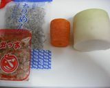 A picture of step 1 of Daikon Radish & Carrot Salad with Crispy Jako.
